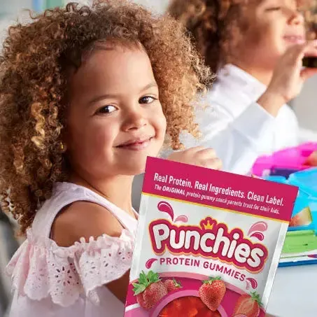 Protein fruit gummies: a smiling girl with a bag of Punchies protein gummies
